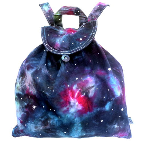 rucksack in nebula with handpainted stars