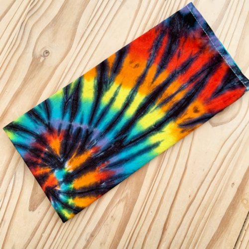 tea towel tie dyed with rainbow and black.