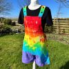 Short dungarees tie dyed in my rainbow colourway with red, orange, yellow, green, turquoise and purple.