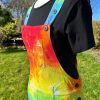 Short dungarees tie dyed in my rainbow colourway with red, orange, yellow, green, turquoise and purple.