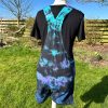 Short dungarees tie dyed in my black peacock colourway with teal, blue and purple slashed with black.