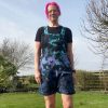 Short dungarees tie dyed in my black peacock colourway with teal, blue and purple slashed with black.