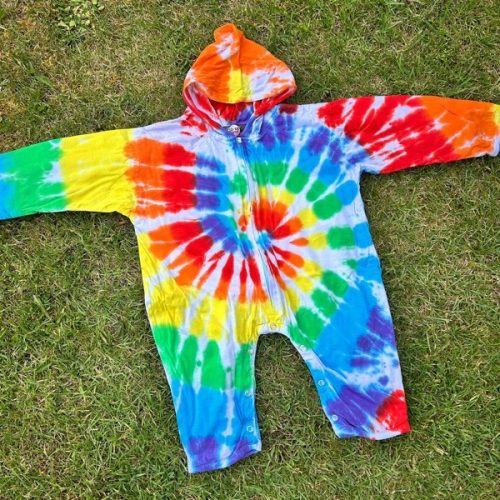 Hooded babygrow tie dyed in a rainbow colourway